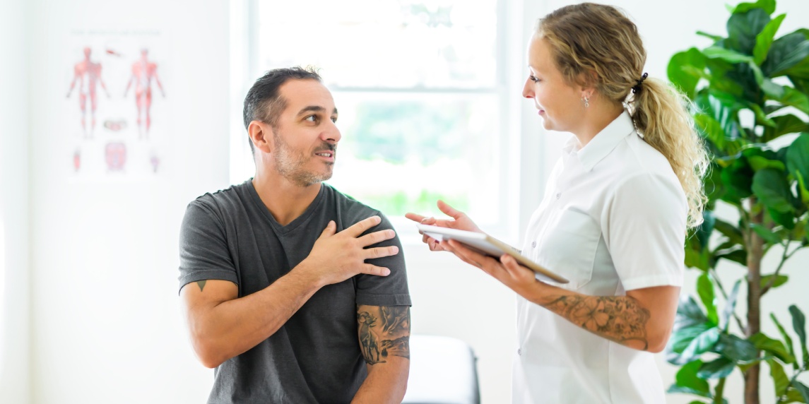 A Modern rehabilitation physiotherapy woman with man client